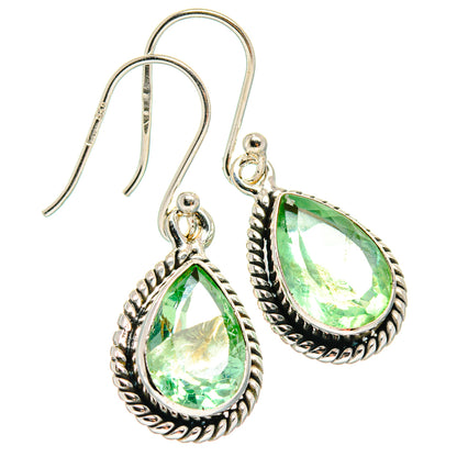 Sterling silver teardrop fluorite earrings with green faceted stone and ornate frame
