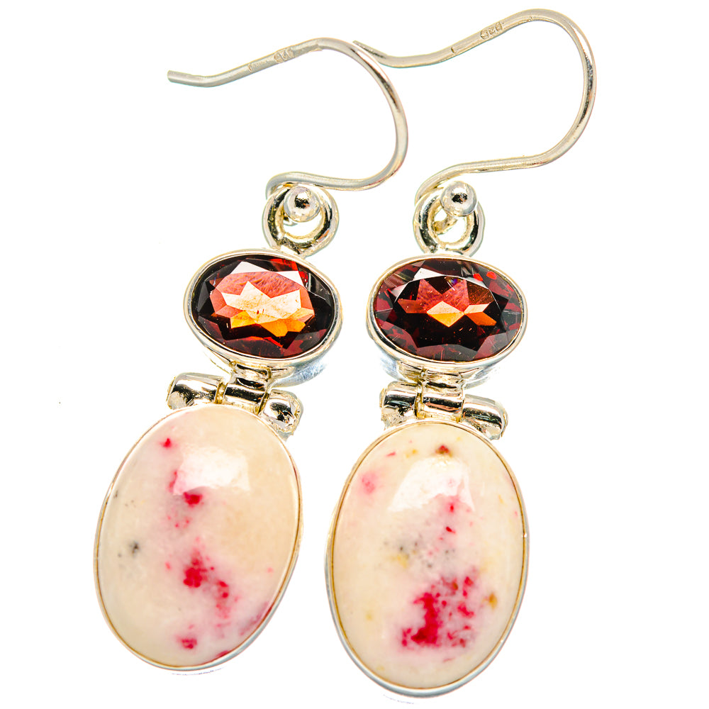 Sterling silver drop earrings with round red gemstone and oval pink cabochons.