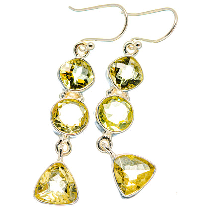 Faceted citrine-yellow drop earrings with round and teardrop stones, silver hooks