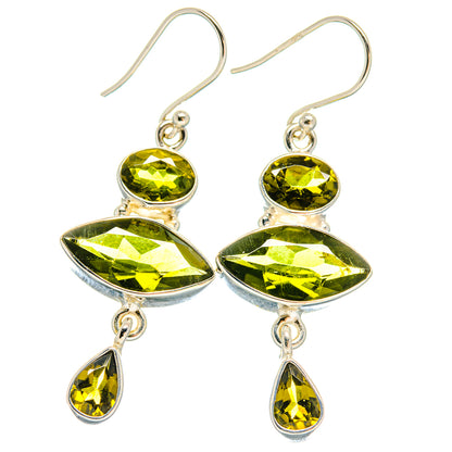 Peridot drop earrings in 925 sterling silver, with three faceted green stones each