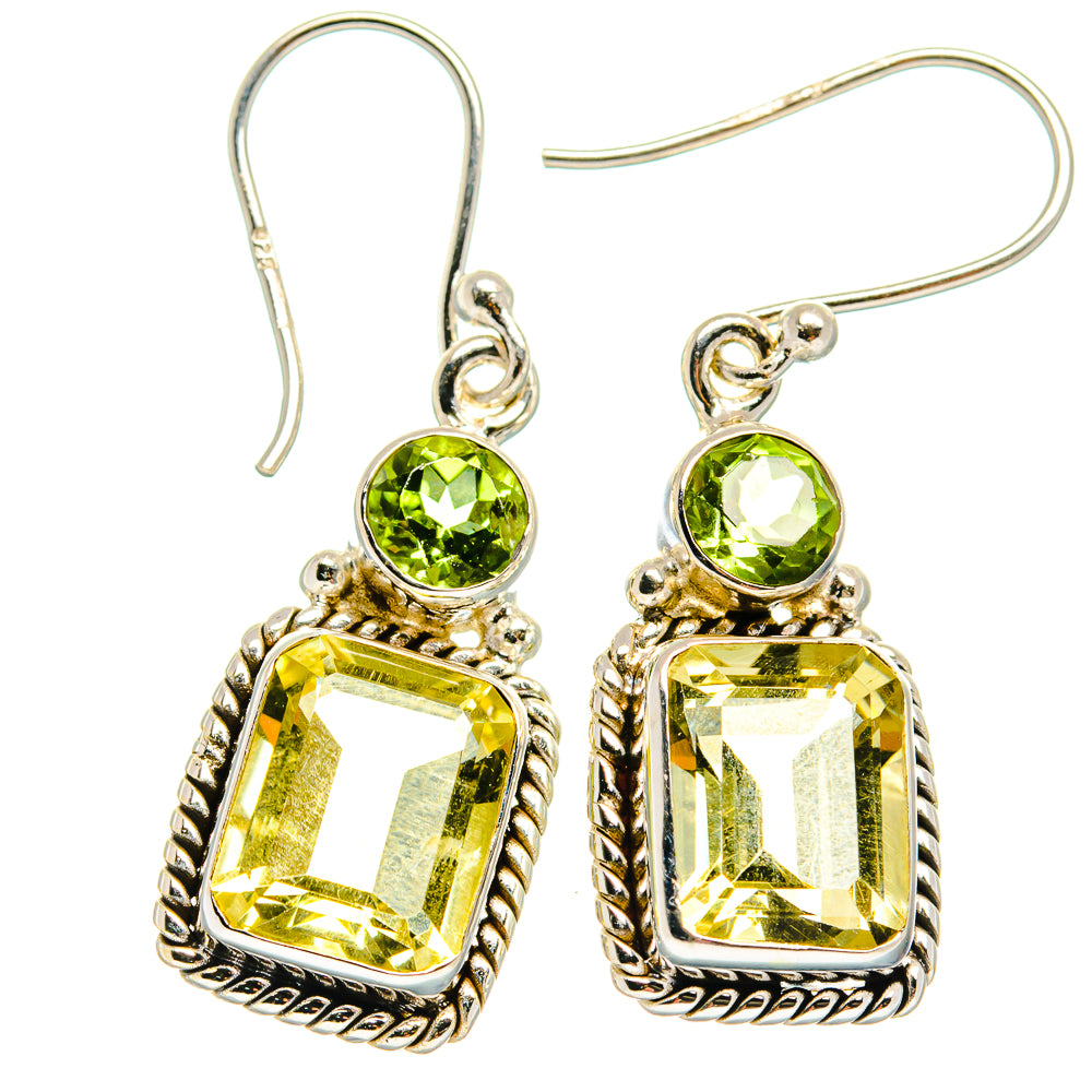 925 sterling silver drop earrings with green round and yellow faceted stones.