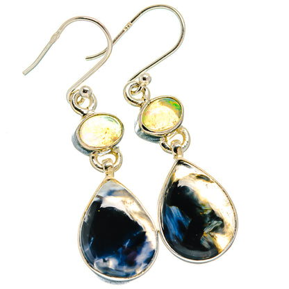 Sterling silver dangle earrings with oval opal accents and dark teardrop stones