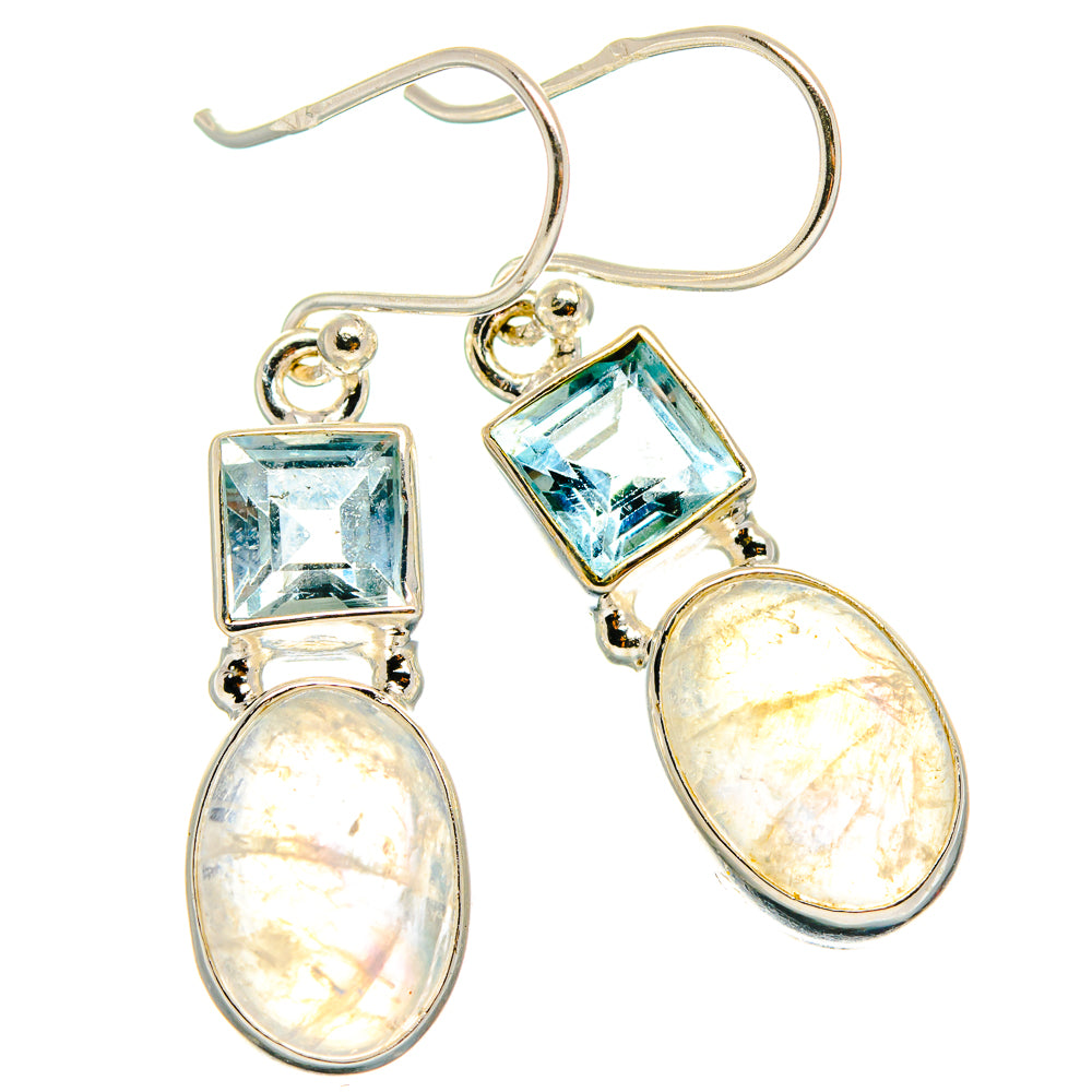Sterling silver drop earrings with square blue topaz and oval rainbow moonstone cabochons