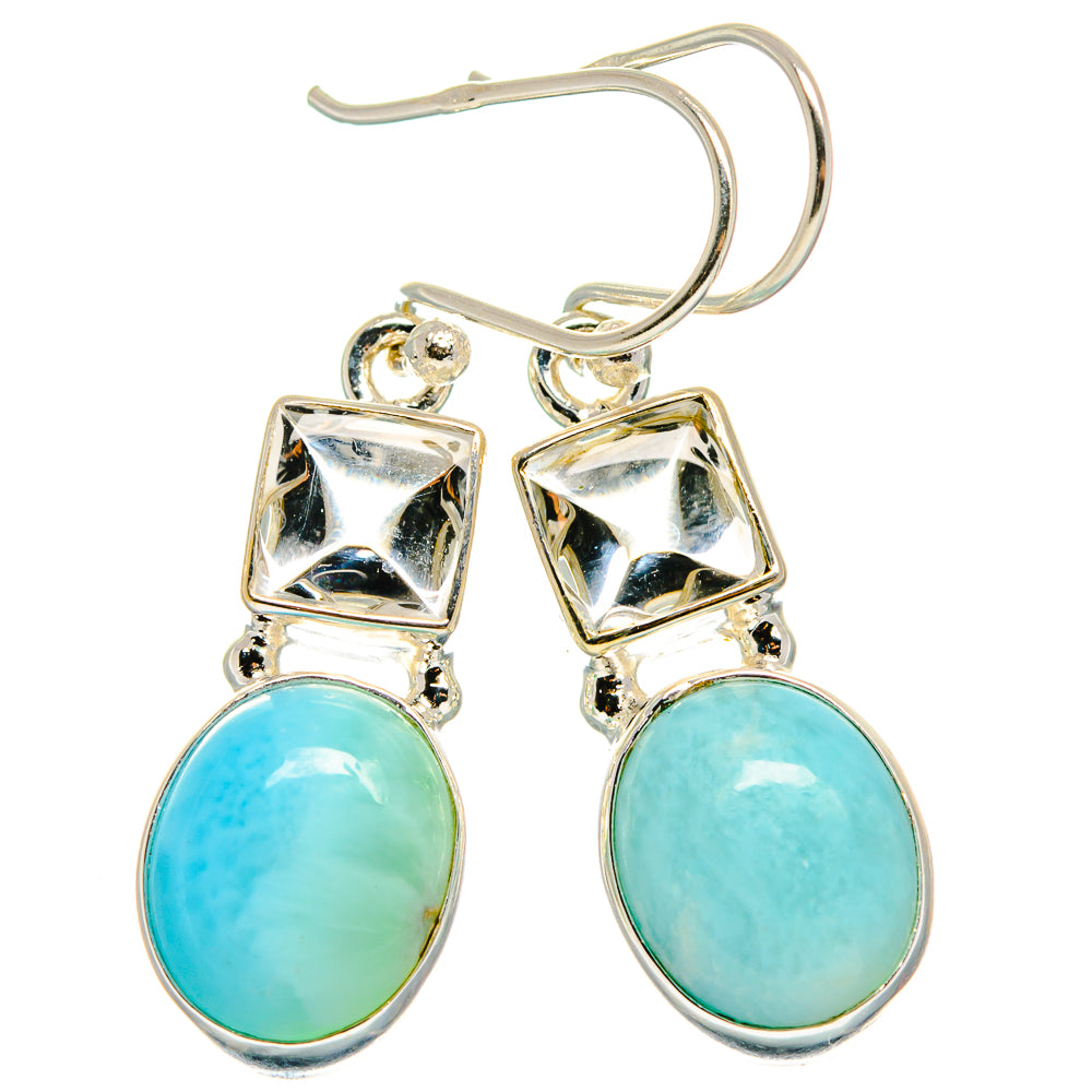 Sterling silver drop earrings with blue oval stones and square dangling top frames