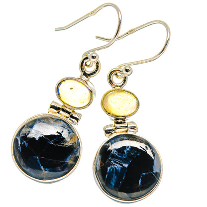 Sterling silver drop earrings with dark blue pietersite discs and yellow opal caps