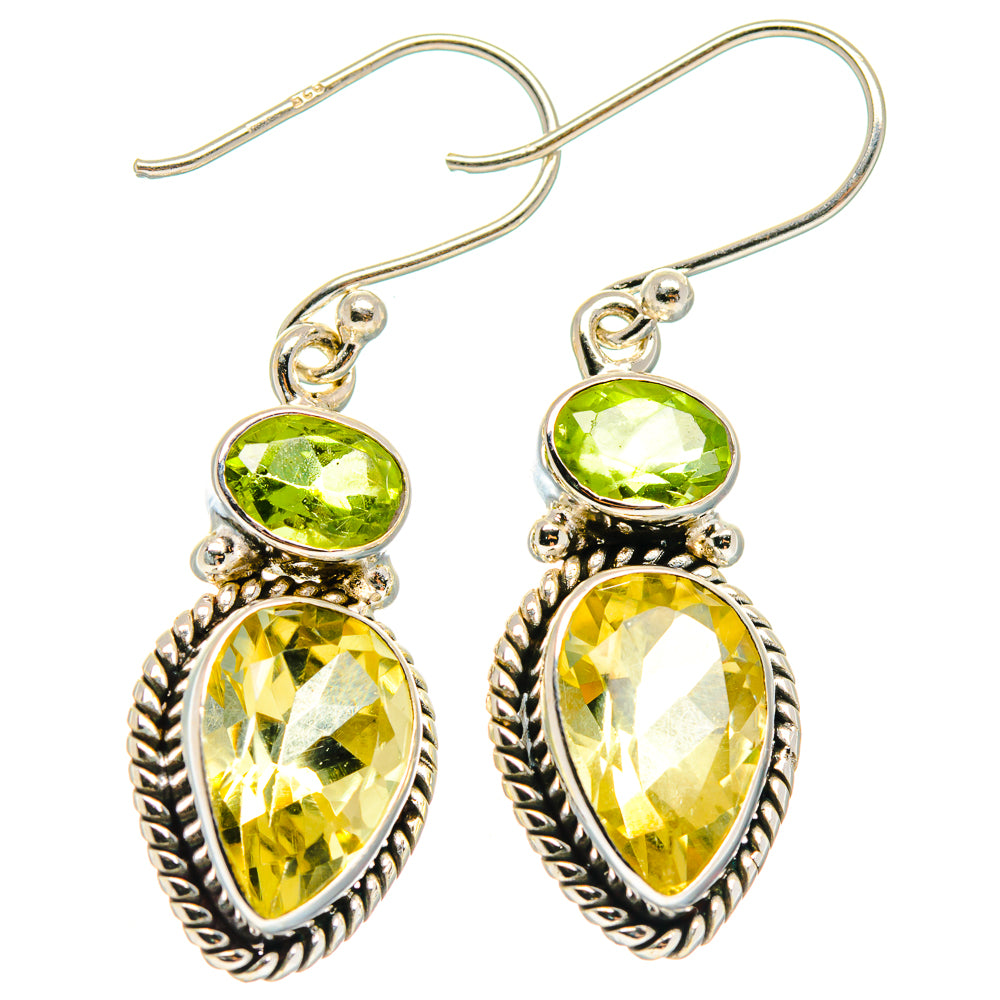 Sterling silver drop earrings with oval green and faceted yellow gemstones