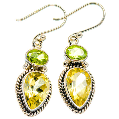 Sterling silver drop earrings with oval green and faceted yellow gemstones