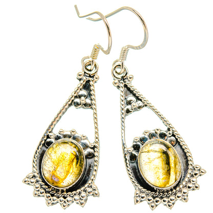 Labradorite drop earrings with ornate silver settings, yellow-gold oval stones and fishhook