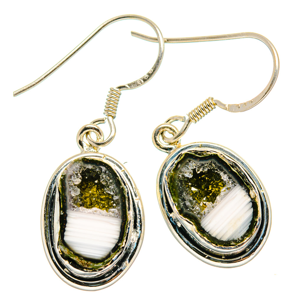 Oval coconut geode druzy earrings with gold-tone bezel, dark green stone and white band