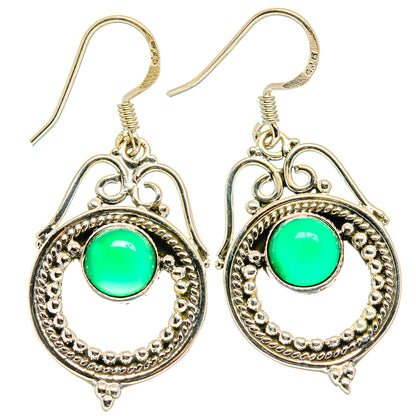 Green onyx drop earrings with ornate silver bezel and hook backs
