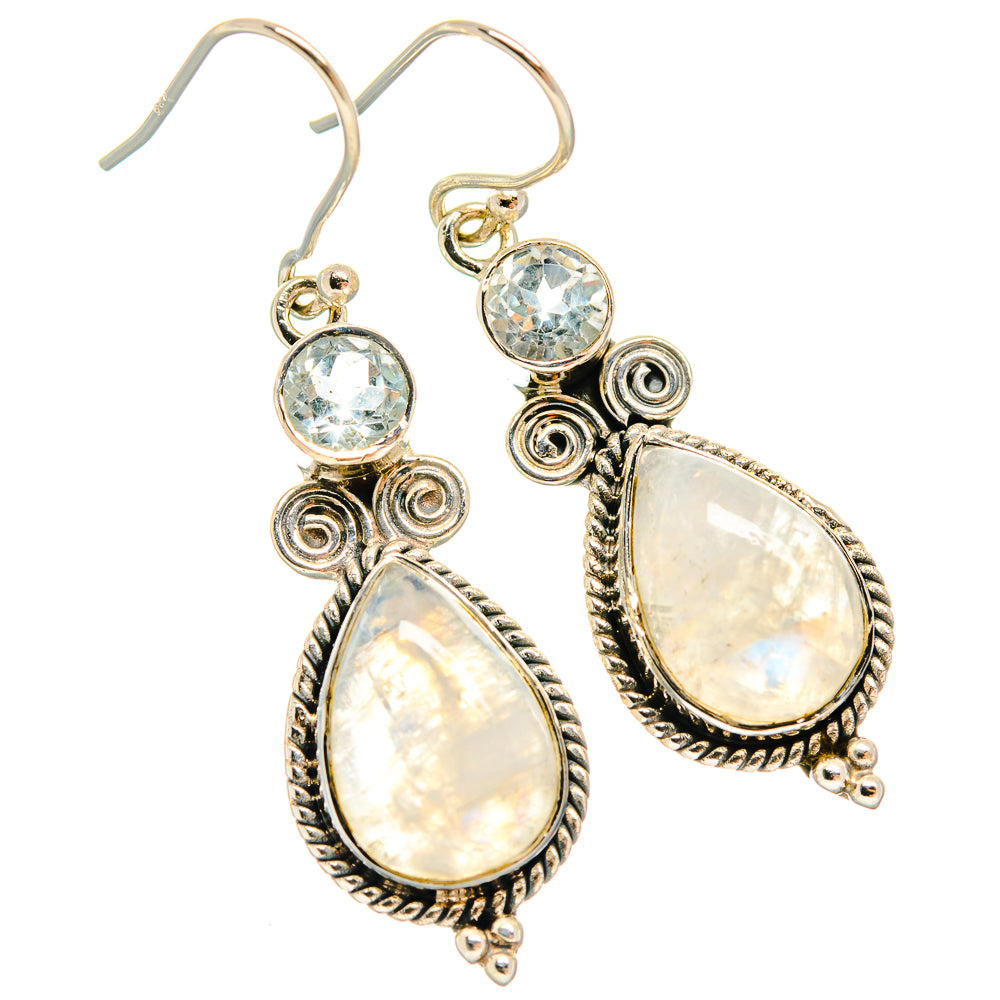 925 sterling silver dangle earrings with ornate swirls, moonstone teardrops, blue topaz rounds