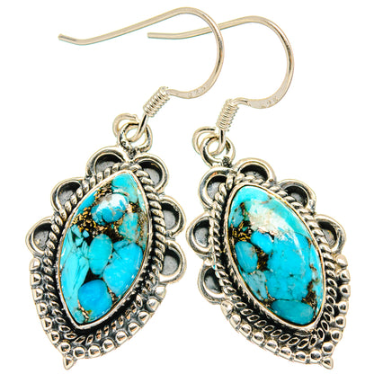 Turquoise composite earrings with ornate sterling silver hooks, oval teardrop stones
