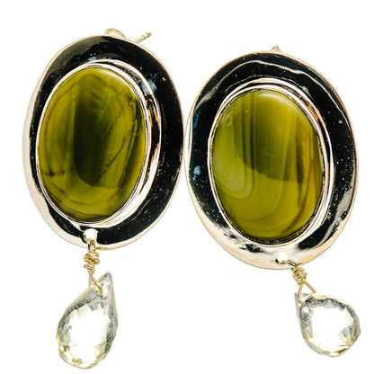 Pair of oval olive green gemstone earrings with silver setting and clear quartz drop charms