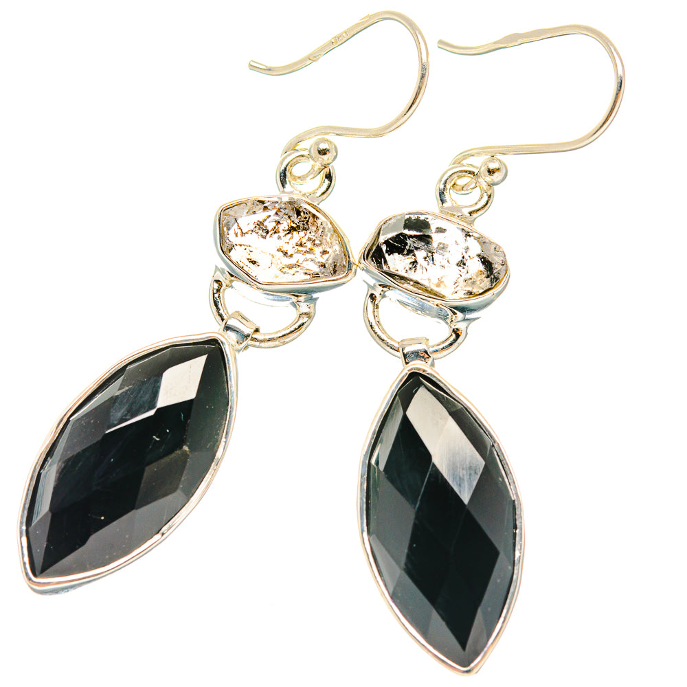 Sterling silver drop earrings with black onyx teardrop and clear faceted stone accents