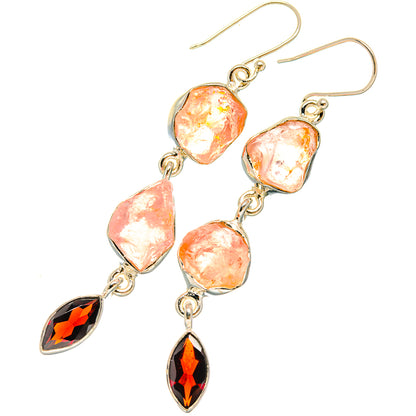 Sterling silver dangle earrings with rough pink stones and dark red teardrop accents
