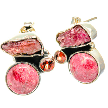 Silver gemstone earrings with round pink stones, pink rough center, and dangling garnets