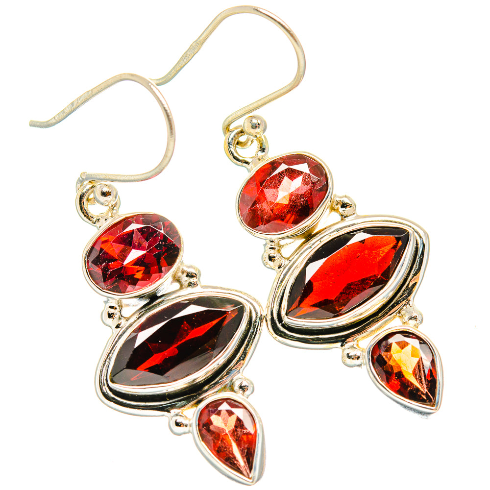 925 sterling silver garnet earrings with red oval, round, and teardrop stones