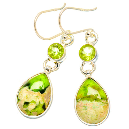 Green teardrop drop earrings with round green stones and silver hooks