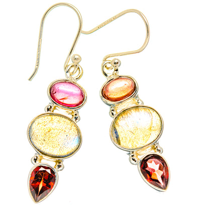 925 sterling silver drop earrings with iridescent blue oval stones and red teardrop garnets