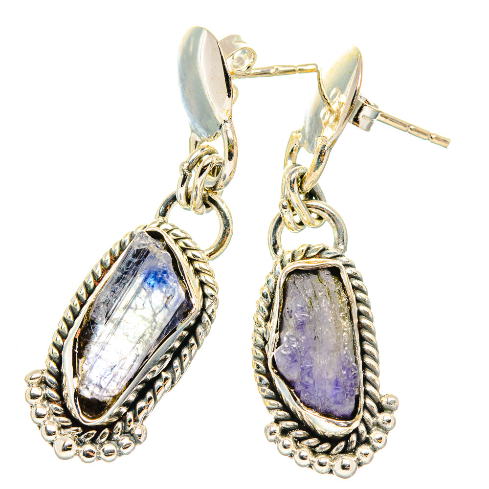 Rough tanzanite drop earrings with lever-back hooks, oval silver frames, textured detail