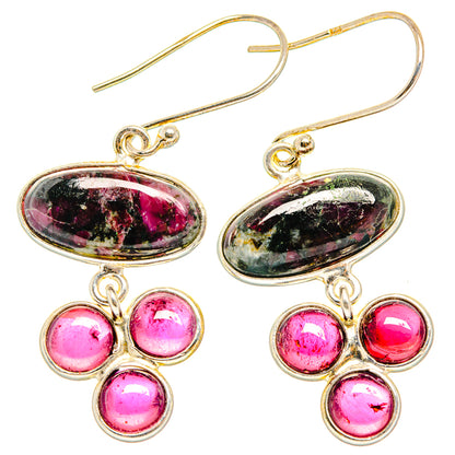 Garnet and eudialyte drop earrings with oval pink-red gemstone and three round pink stones