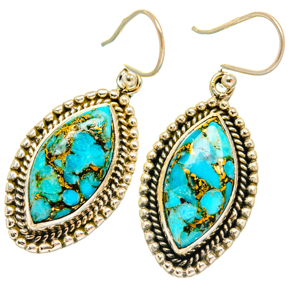 Teardrop turquoise gemstone earrings with ornate silver-tone bezel and hook backs
