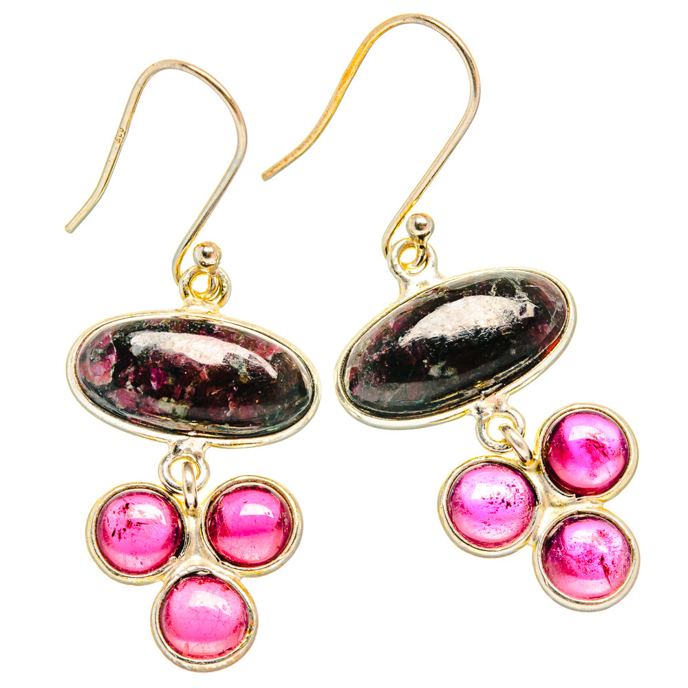 Sterling silver oval drop earrings with pink-speckled stones and four pink round gems