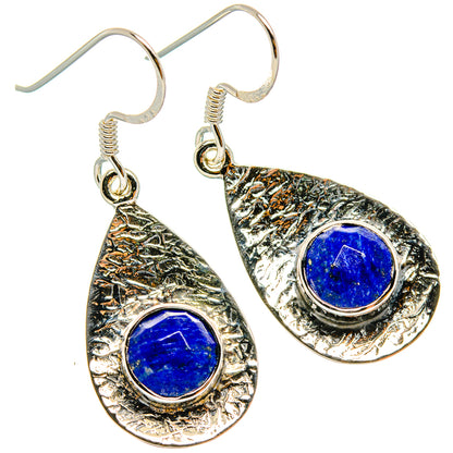 Silver teardrop drop earrings with round blue lapis stones and hooked closures
