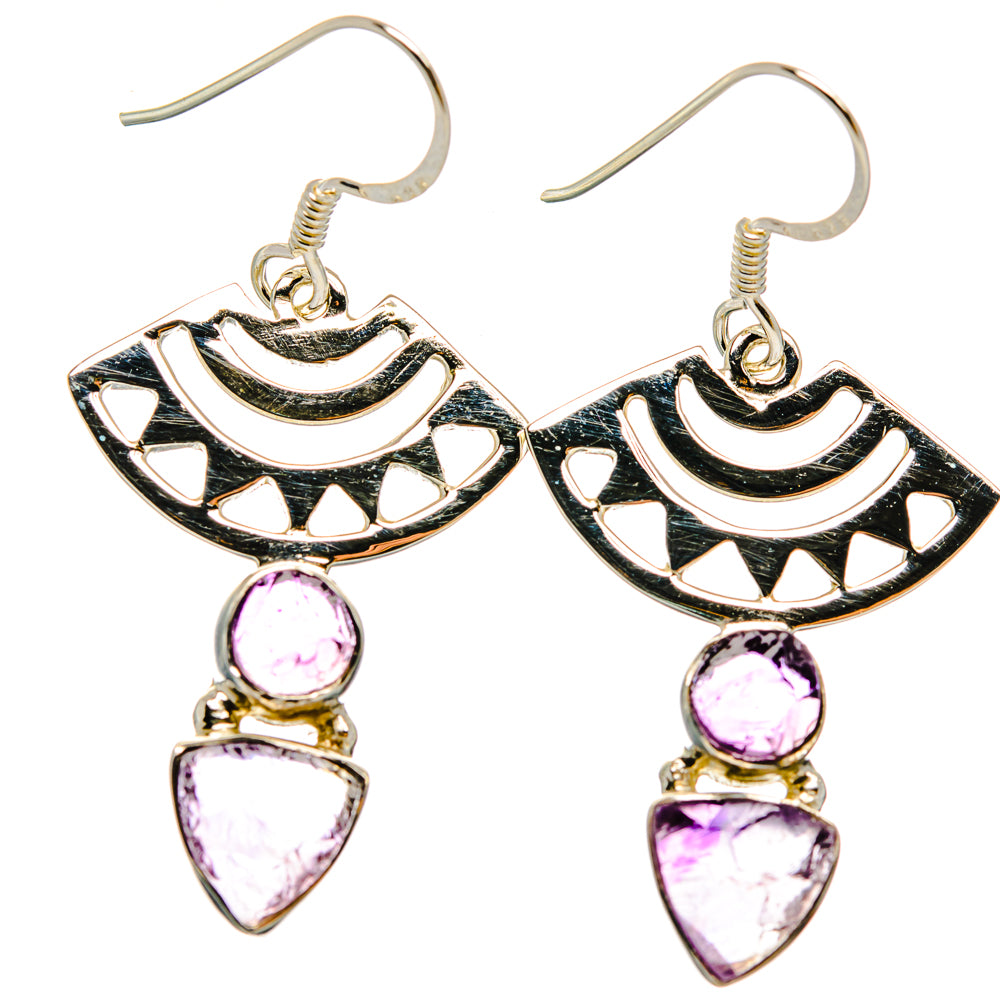Sterling silver dangle earrings with black cutout designs and pink amethyst stones