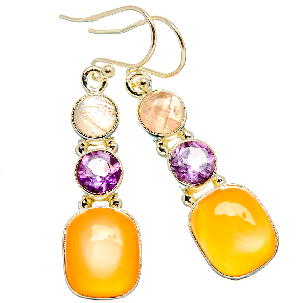 Gold-tone dangling earrings with peach, purple, and orange faceted gemstone drops