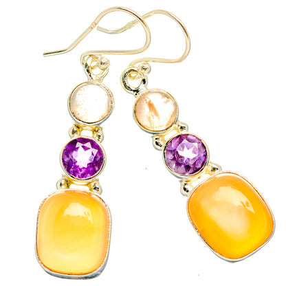 Sterling silver fishhook earrings with round amethyst and oval yellow-orange moonstone