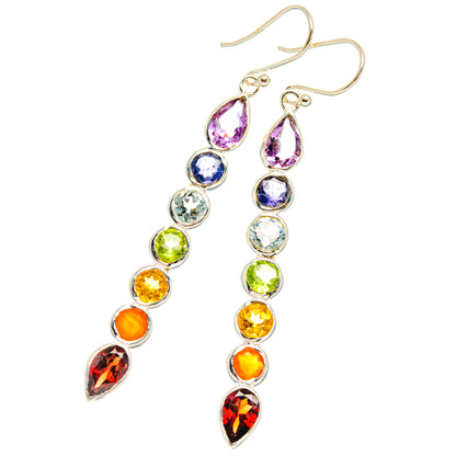 Multicolor teardrop chakra drop earrings with silver hook backs and rainbow stones