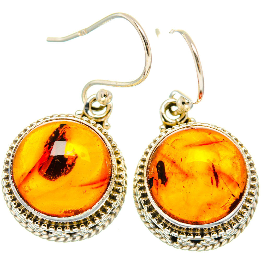 Amber oval drop earrings with sterling silver round bezel and lever backs, pair