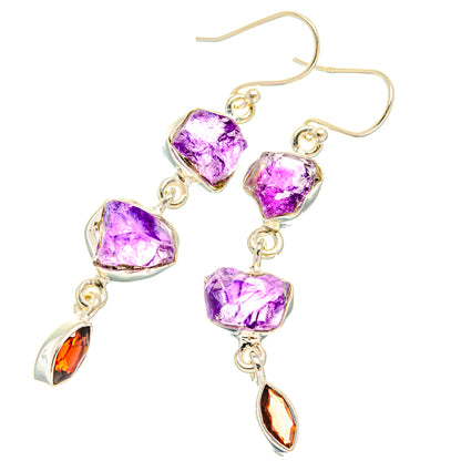 Sterling silver earrings with rough purple stones and dangling amber teardrop accents