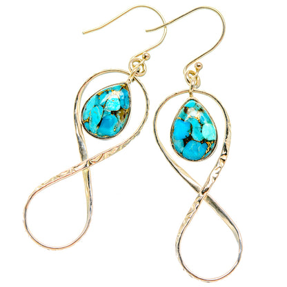Turquoise oval drop earrings with silver teardrop frames and hanging hook wires