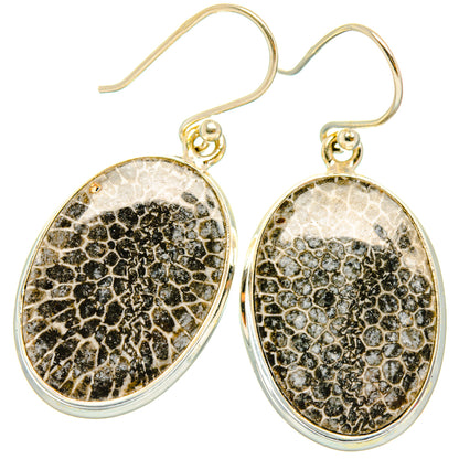 Sterling silver oval drop earrings with black-and-gold stingray pattern and hook backs