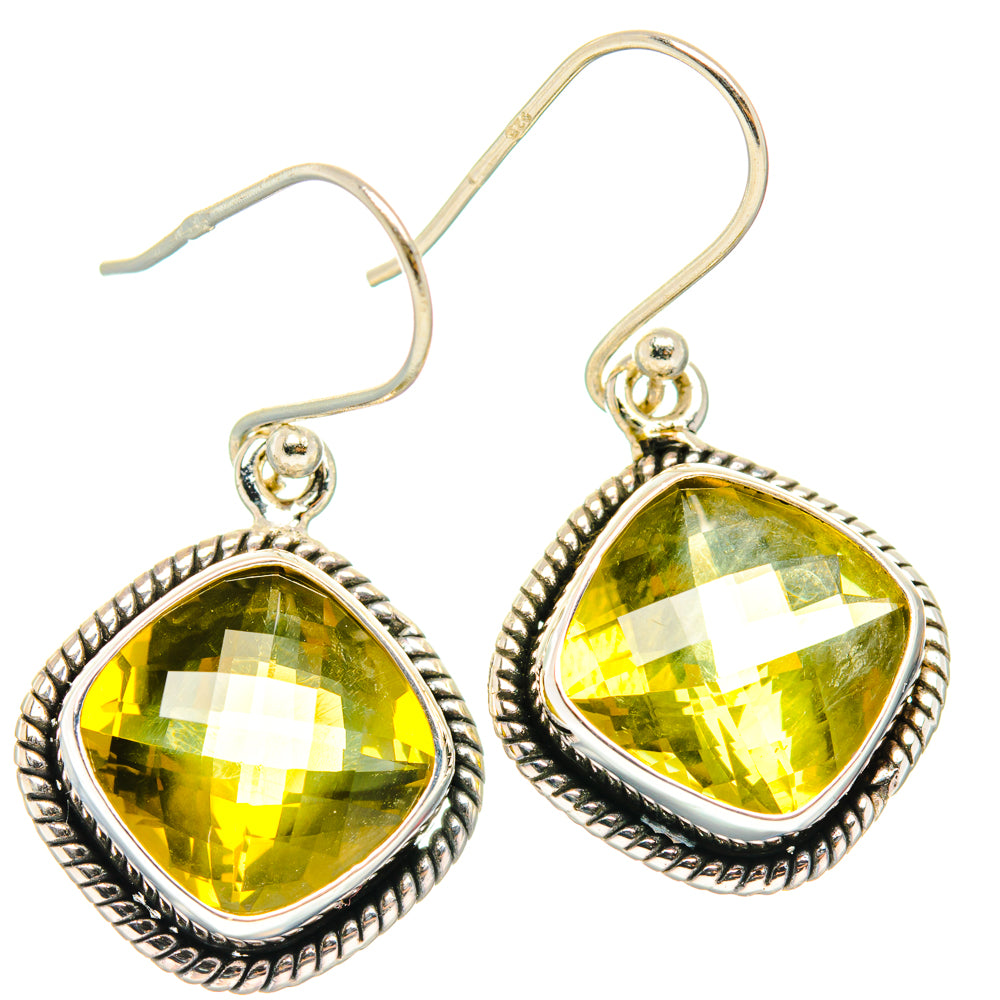 Sterling silver lemon quartz drop earrings with faceted pear-cut yellow stones