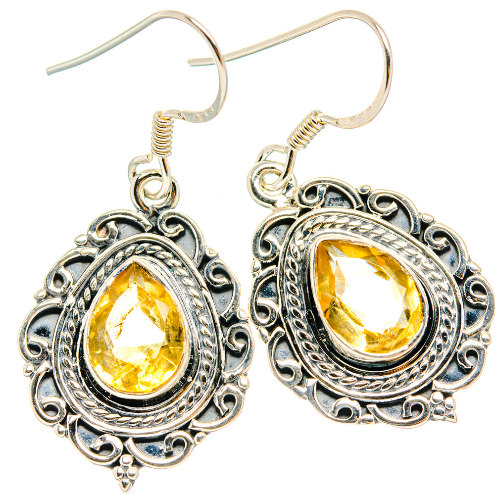 Faceted oval citrine dangling earrings; detailed 925 sterling silver filigree with hooks