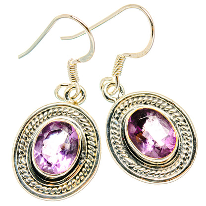 Sterling silver amethyst drop earrings with faceted oval stones in round filigree bezel