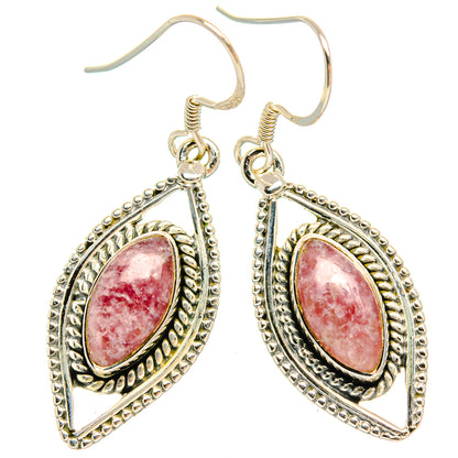Sterling silver teardrop dangle earrings with pink cabochon and decorative border
