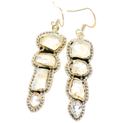 Moonstone dangle earrings with rough oval stones and small round accents, 925 silver
