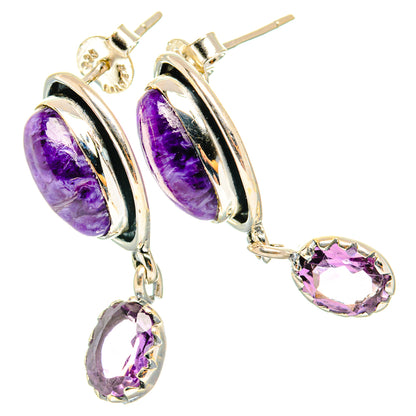 Sterling silver hoop-style earrings with oval purple charoite and faceted amethyst drops