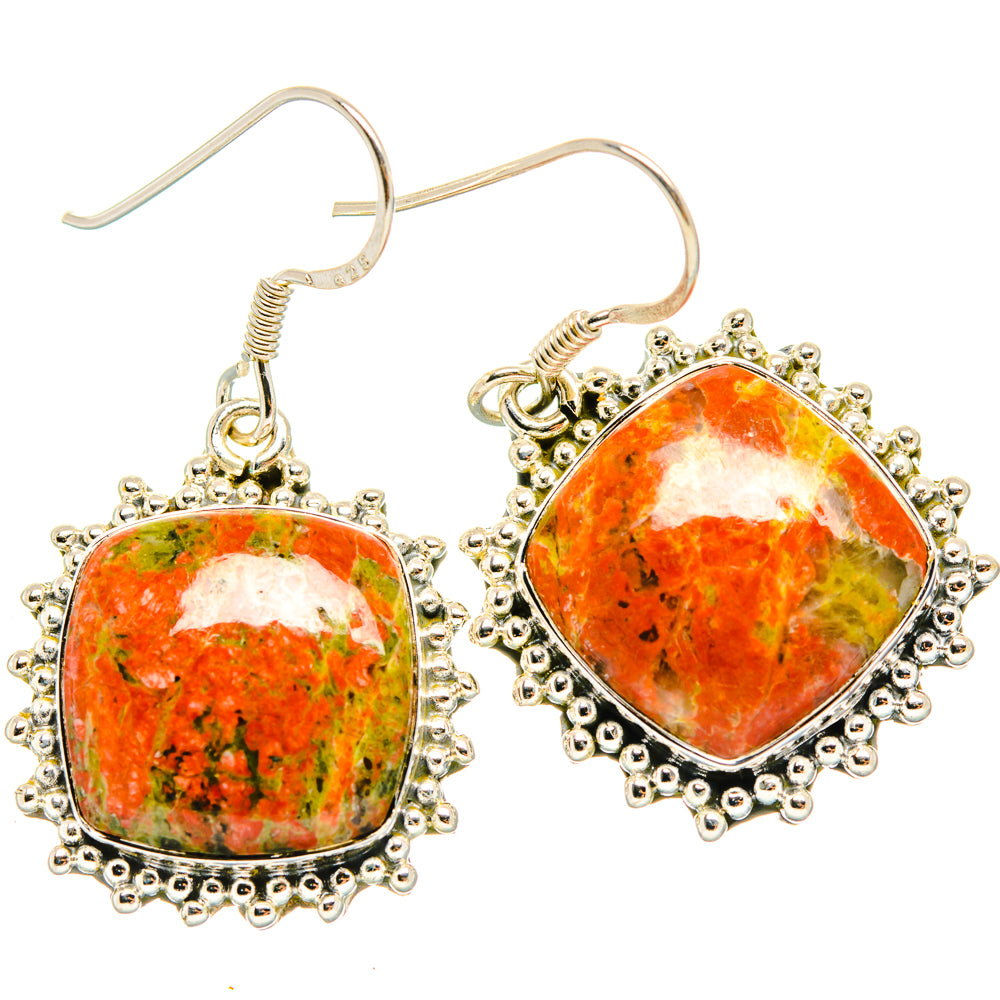 Sterling silver drop earrings with orange unakite cabochon and beaded halo settings
