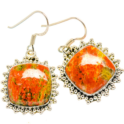 Sterling silver drop earrings with orange unakite cabochon and beaded halo settings