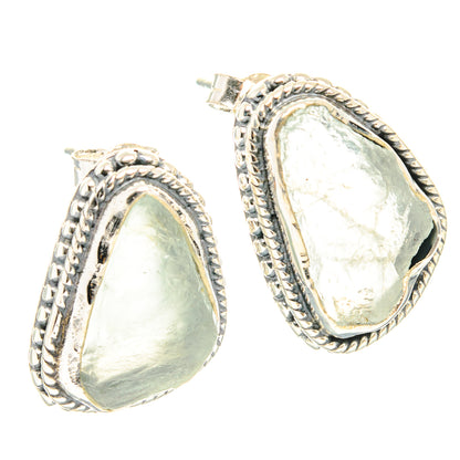 925 sterling silver earrings with rough aquamarine teardrop stones and rope bezel border