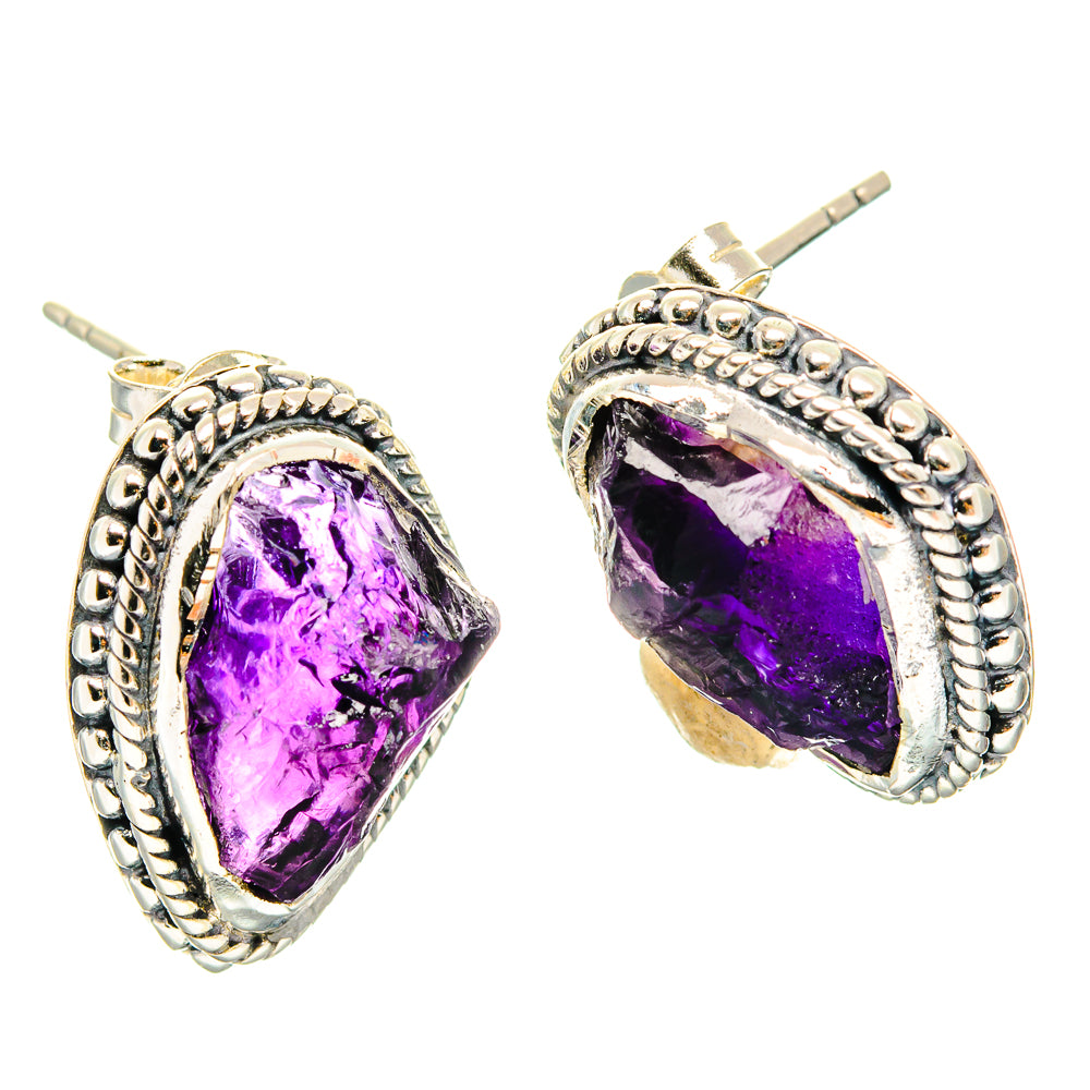 Rough amethyst teardrop earrings in 925 sterling silver with rope bezel and purple stone