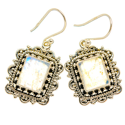 Gold-tone filigree drop earrings with square rainbow moonstone centers and fishhook wires