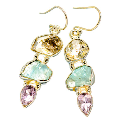 Silver-tone dangling earrings with light blue and pink teardrop gemstone accents