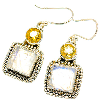 Sterling silver hook earrings with yellow citrine circles and opalescent square framed drops