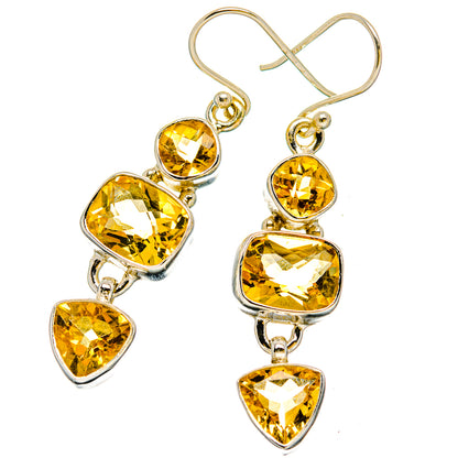 Faceted citrine drop earrings in sterling silver with three yellow heart-shaped stones